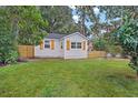 Newly painted home with a lush green lawn at 3170 6Th S Ave, St Petersburg, FL 33712