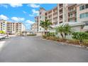 Parking area with access to the building at 13313 Gasparilla Rd # 402, Placida, FL 33946