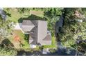 Aerial view showcasing the house's location and waterfront access at 18212 Oakdale Rd, Odessa, FL 33556