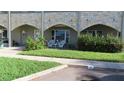 Building exterior with charming entryway and landscaping at 2462 Brazilia Dr # 20, Clearwater, FL 33763