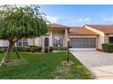 Attractive brick home with well-manicured lawn at 5935 Precious View Ct, New Port Richey, FL 34655