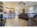 Open kitchen with granite countertop and stainless steel appliances at 9696 Groveland St, Seminole, FL 33772
