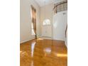 Bright and spacious entryway with high ceilings and wood flooring at 17929 Timber View St, Tampa, FL 33647