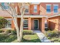 Townhome exterior showcasing the front entrance at 2066 Sun Down Dr 2066 Sun Down Dr, Clearwater, FL 33763