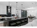 Modern kitchen with large island and wine storage at 1308 W Plymouth St, Tampa, FL 33603