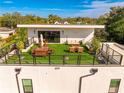 Modern rooftop deck features artificial turf and city views at 1308 W Plymouth St, Tampa, FL 33603