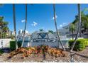 Captiva Cay community entrance sign with landscaping at 9359 Blind Pass Rd # 205, St Pete Beach, FL 33706