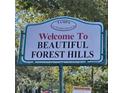 Welcome to Beautiful Forest Hills neighborhood sign at 11523 Forest Hills Dr, Tampa, FL 33612