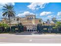 Upscale building exterior showcasing architectural details and landscaping at 501 Knights Run Ave # 1217, Tampa, FL 33602