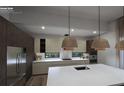 Modern kitchen with stainless steel appliances and island at 1810 W Erna Dr, Tampa, FL 33603