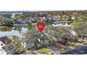 Aerial view showcasing condo's waterfront location in a quiet community at 155 Nina Way, Oldsmar, FL 34677