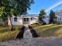 Light purple bungalow with new landscaping at 3631 4Th N Ave, St Petersburg, FL 33713