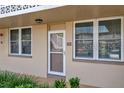 Condo building exterior showcasing a neat entrance at 4915 Bay Ne St # 123, St Petersburg, FL 33703