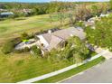 Property features a spacious backyard, pool, and is located in a golf community at 435 Palmdale Dr, Oldsmar, FL 34677