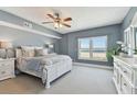 Spacious bedroom with ocean view and white furniture at 4950 Gulf Blvd # 206, St Pete Beach, FL 33706