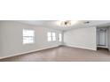 Bright and airy living room with light hardwood floors and neutral walls at 9126 109Th Ter, Seminole, FL 33777