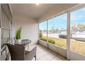Enjoy the view from this screened porch with seating for two at 4444 Swift Rd # 20, Sarasota, FL 34231