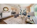 Bright and airy living room with comfy seating and large windows at 833 Leeward Way, Palm Harbor, FL 34685
