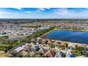 House nestled in a community by a lake at 708 Fern Leaf Dr, Ruskin, FL 33570