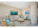 Bright and airy lobby with comfortable seating and artwork at 7100 Sunset Way # 205, St Pete Beach, FL 33706