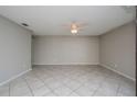 Large living room featuring neutral walls and tile floors at 4721 Grove Point Dr, Tampa, FL 33624