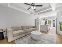 Living room with a neutral color palette and access to the kitchen at 554 6Th N Ave, St Petersburg, FL 33701