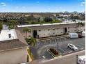 Aerial view of building, parking lot, and surrounding area at 8814 Bay Pointe Dr # 204, Tampa, FL 33615