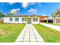 Newly renovated home exterior, curb appeal at 4008 W Leila Ave, Tampa, FL 33616