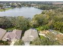 Aerial shot showcases the home's lakefront location and private backyard at 106 Rosana Dr, Brandon, FL 33511