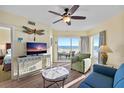 Bright living room with ocean view and balcony at 12000 Gulf Blvd # 501-W, Treasure Island, FL 33706