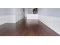Spacious living room with hardwood floors and lots of natural light at 4770 White Sanderling Ct, Tampa, FL 33619