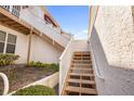 Exterior stairs leading to upper level condo at 1420 Water View W Dr # 203, Largo, FL 33771