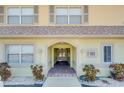 Attractive building entryway with a brick-paved walkway at 600 71St Ave # 17, St Pete Beach, FL 33706