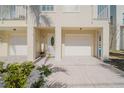 Two-car garage with entrance to the home at 140 Brightwater Dr # 6, Clearwater Beach, FL 33767