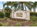 Bay Isle Landings community entrance sign with flowers at 5162 Bay Isle Cir, Clearwater, FL 33760