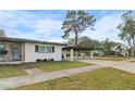 Ranch home with carport and well-manicured lawn at 6602 S Emerson Ave, St Petersburg, FL 33707