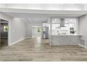 Modern kitchen with stainless steel appliances and marble island at 6602 S Emerson Ave, St Petersburg, FL 33707