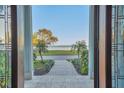 Grand entry door welcomes you to water views, with beautiful landscaping at 2001 Beach Se Dr, St Petersburg, FL 33705