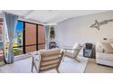 Living room with water views and stylish seating at 2424 W Tampa Bay Blvd # A210, Tampa, FL 33607