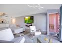 Spacious living area with large TV and comfortable seating at 2424 W Tampa Bay Blvd # A210, Tampa, FL 33607