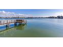 Private dock offering waterfront access and scenic views at 16323 Redington Dr, Redington Beach, FL 33708