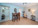 Condo dining area with wood floors and small table at 4580 Overlook Ne Dr # 297, St Petersburg, FL 33703