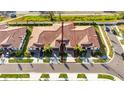 Aerial view of a townhome community at 17554 Holly Well Ave, Wimauma, FL 33598
