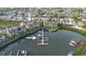 Aerial view of townhouses and private boat docks at 4338 Spinnaker Cove Ln, Tampa, FL 33615