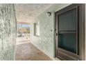 Entrance showing the exterior texture and door to the unit at 801 83Rd N Ave # 120, St Petersburg, FL 33702