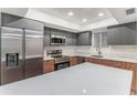 Modern kitchen with stainless steel appliances and island at 801 83Rd N Ave # 120, St Petersburg, FL 33702