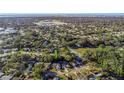 Bird's eye view of the property and surrounding houses at 1392 Overlea Dr, Dunedin, FL 34698