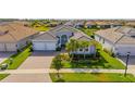 Luxury home in a residential community with a view of the neighborhood at 4919 Pamplona Ct., Wimauma, FL 33598