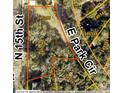 Aerial view showing lot lines and surrounding area at 1505 E Park Cir, Tampa, FL 33610