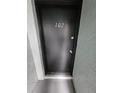 Condo unit entrance with black door and number 102 at 2850 Somerset Park Dr # 102, Tampa, FL 33613